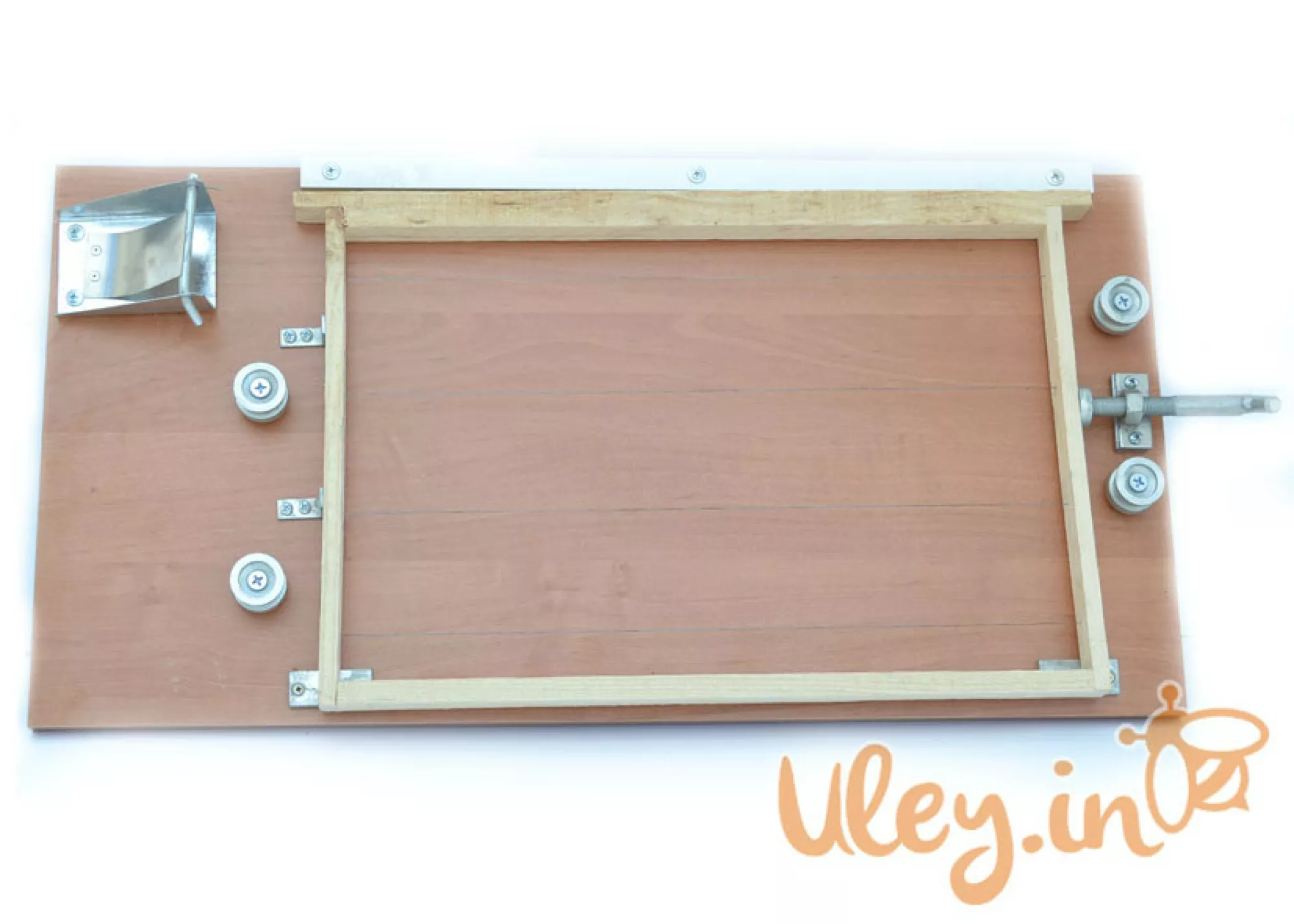 Пристосування для оснащення бджільницьких рамок дротом