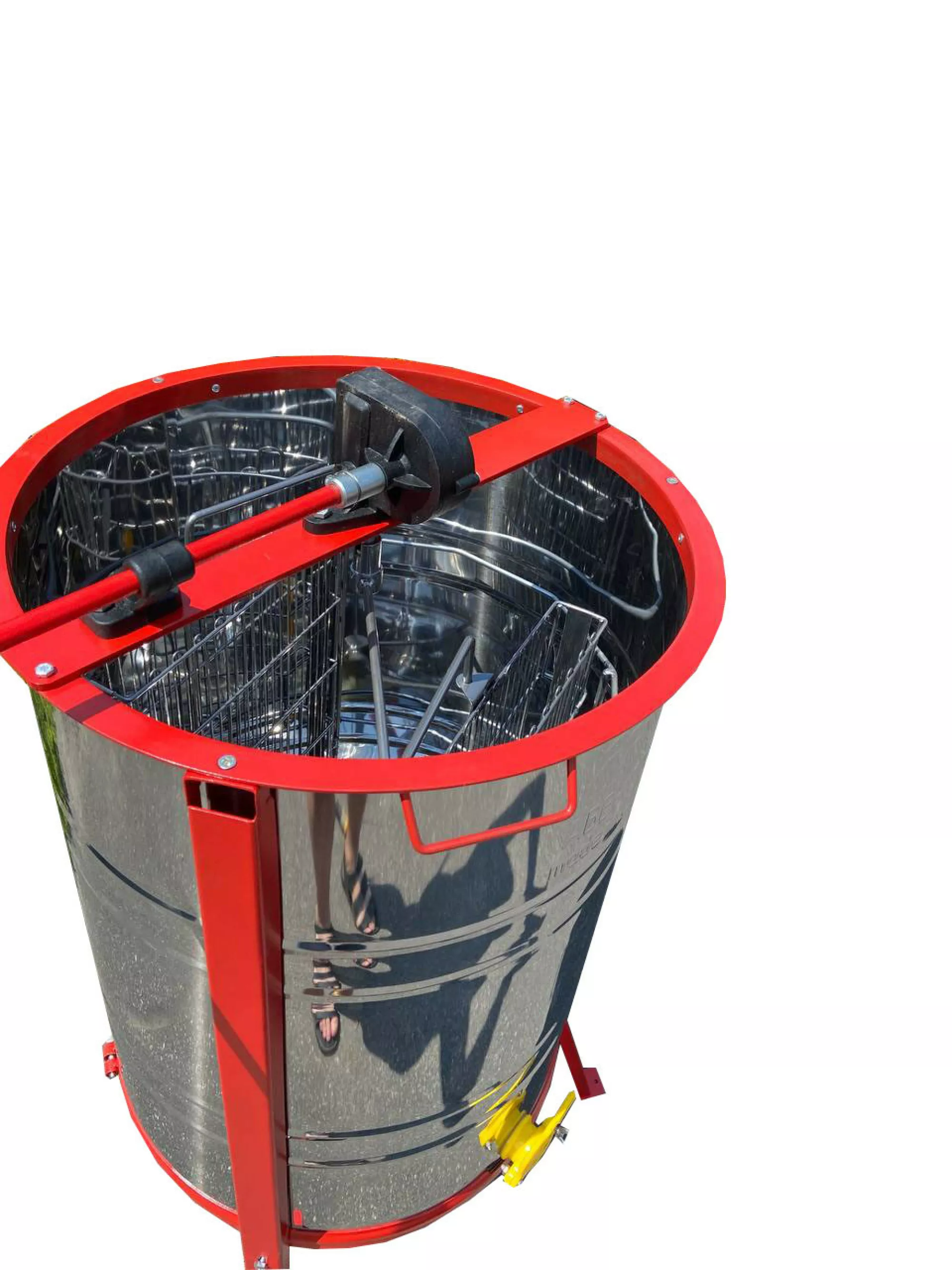 Нержавіюча медогонка з поворотом касет 2-х рамкова, касета зварена, пофарбована порошковою фарбою. З підставкою