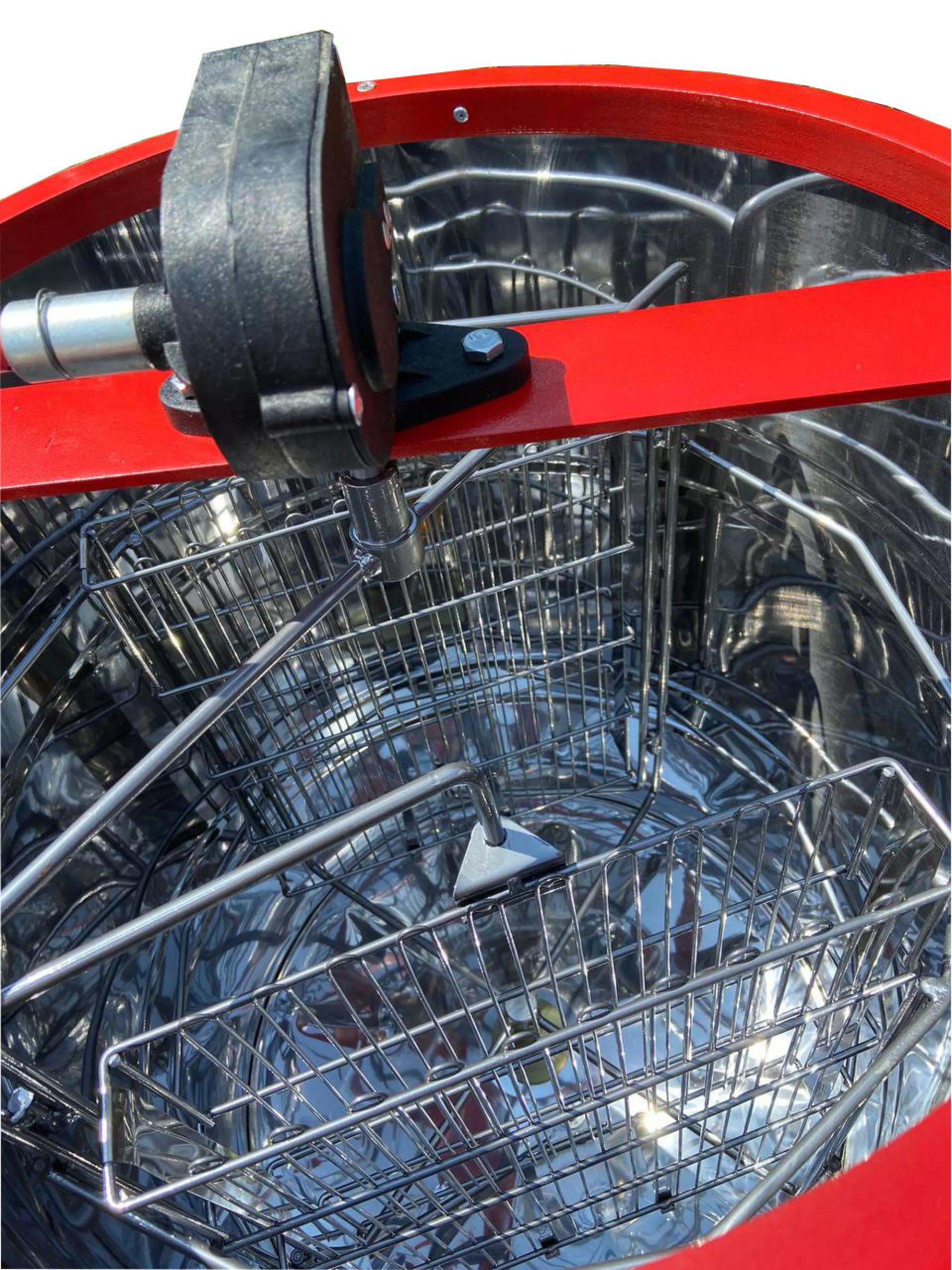 Нержавіюча медогонка з поворотом касет 2-х рамкова, касета зварена, пофарбована порошковою фарбою. З підставкою